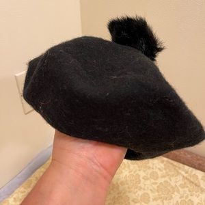 100% wool hat in black by Collectioneighteen. New.